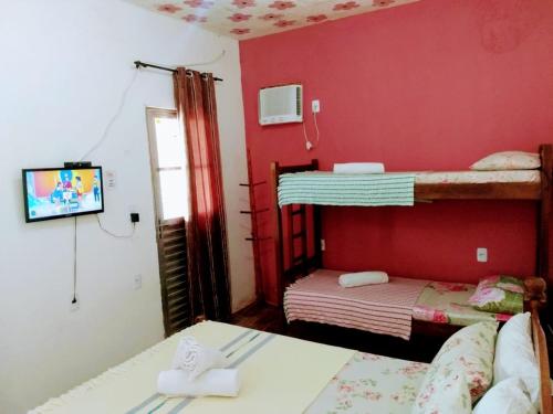 Katil dua tingkat atau katil-katil dua tingkat dalam bilik di Pousada Sol de Imbassai