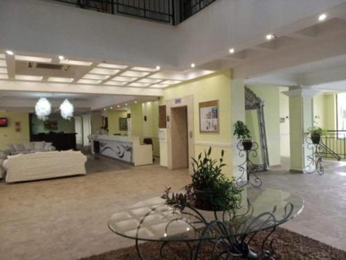a large room with a couch and a table at Festa Studio in Pomorie