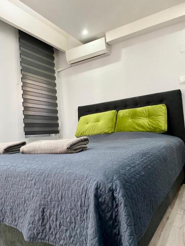 Postel nebo postele na pokoji v ubytování STUDIO Vladana