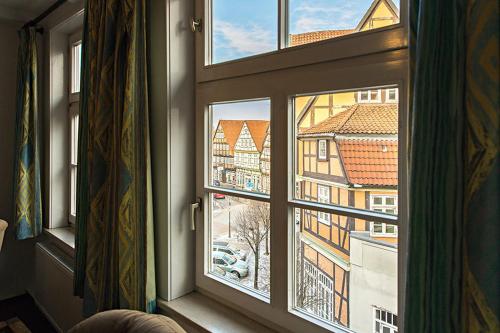a window with a view of a city at Gasthof Altenceller Tor in Celle