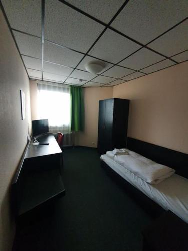 Hotel Vi Vintage S-Weilimdorfにあるベッド