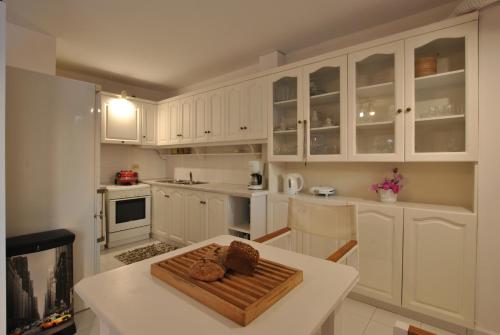 Η κουζίνα ή μικρή κουζίνα στο Stavento Apartments