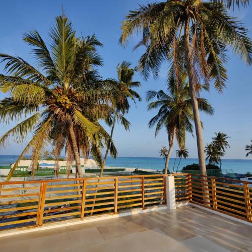 a view of the beach from the house at Cowry Inn in Fulidhoo