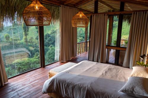 Postel nebo postele na pokoji v ubytování Eco Hotel Glamping El Silencio