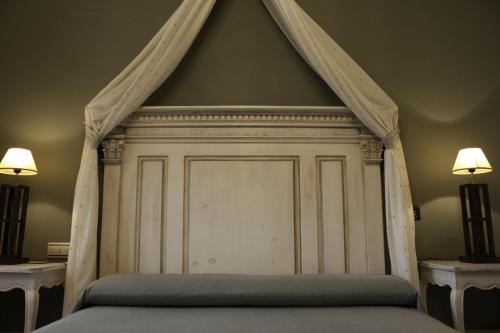 Postel nebo postele na pokoji v ubytování Hotel Posada La Robleda