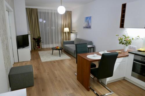 Kuchyň nebo kuchyňský kout v ubytování Kieślowskiego Apartment vis-a-vis Town Hall
