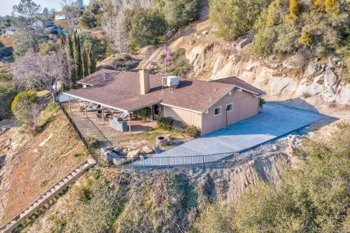 an aerial view of a house on a mountain at Mountain Trail Lodge and Vacation Rentals in Oakhurst