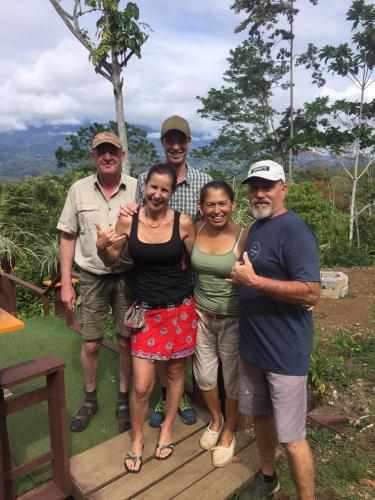 a group of people posing for a picture at Bella Vista Ranch Ecolodge in Turrialba