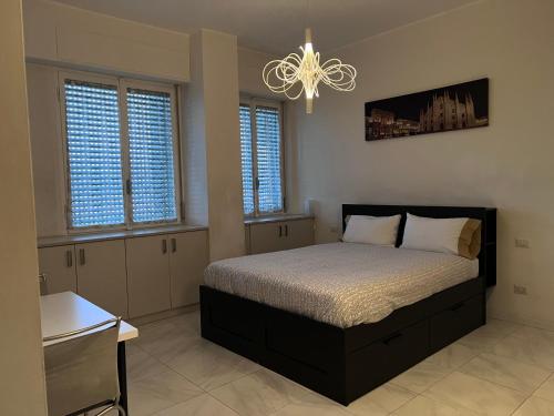 Ένα ή περισσότερα κρεβάτια σε δωμάτιο στο Casa Luca