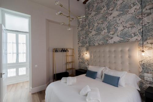 Gulta vai gultas numurā naktsmītnē Casa Mariana - Luxury Apartment - 4 Personas