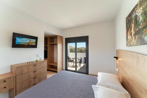 Postel nebo postele na pokoji v ubytování Domus Oliva Villas