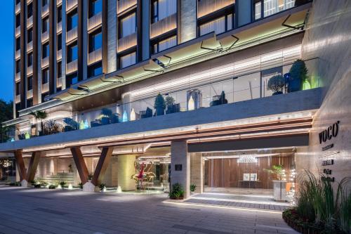 a view of the front of a building at voco Nanjing Oriental Pearl in Nanjing
