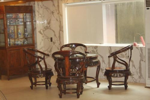 Area soggiorno di Marigold Hotel & Apartment