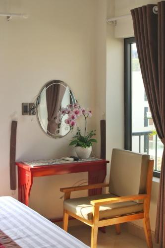 Area soggiorno di Marigold Hotel & Apartment