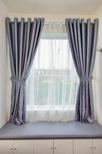 Postel nebo postele na pokoji v ubytování Royal Hotel Ninh Thuận
