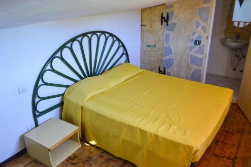 Cama ou camas em um quarto em Holiday residence I Nuraghi Cannigione - ISR01100d-SYA