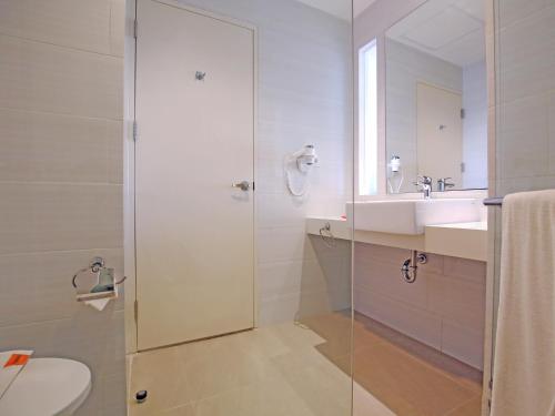 Koupelna v ubytování HARRIS Hotel Samarinda