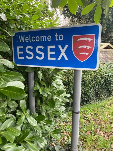 a blue sign that says welcome to essex at Kellys Holiday Homes 24 Willerby 2 bedrooms caravan in Weeley
