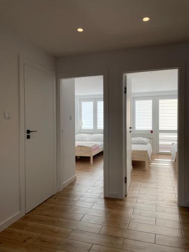 Postel nebo postele na pokoji v ubytování Apartament -Dwudziestka