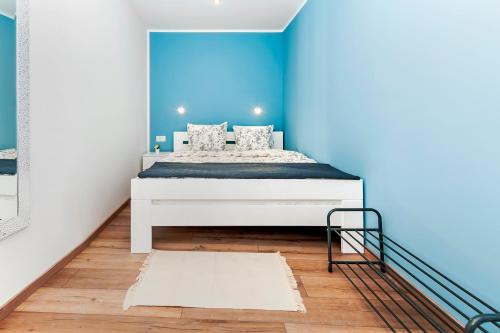 Posteľ alebo postele v izbe v ubytovaní OTTO apartment with sea view and parking