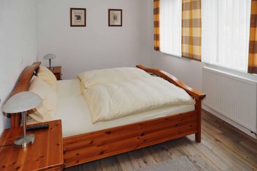 Ένα ή περισσότερα κρεβάτια σε δωμάτιο στο Restaurant - Garni bei Peppo