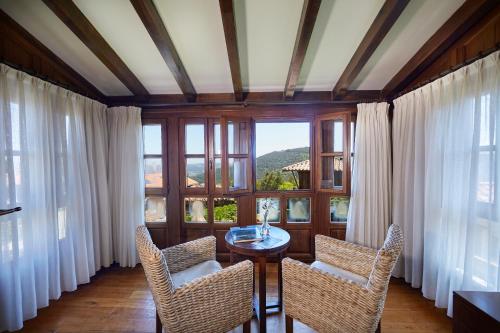 Posezení v ubytování La Quintana de Somao, Casa de Abajo