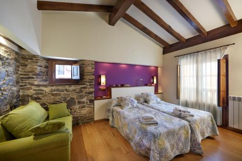 Postel nebo postele na pokoji v ubytování La Quintana de Somao, Casa de Abajo