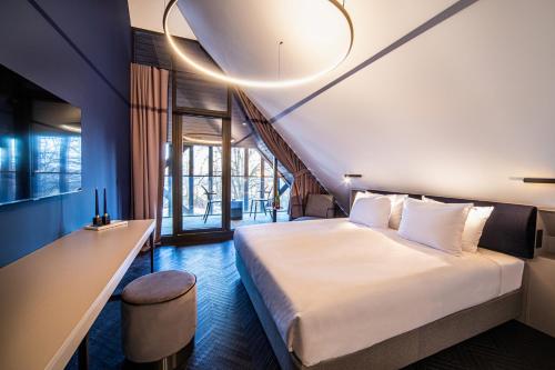 Postelja oz. postelje v sobi nastanitve Hotel Čad