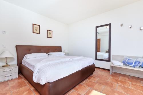 Ein Bett oder Betten in einem Zimmer der Unterkunft Hotel Maximilian