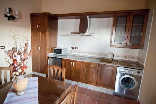 Η κουζίνα ή μικρή κουζίνα στο Apartamentos Turisticos Sanahuja