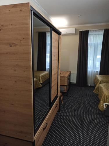 Postel nebo postele na pokoji v ubytování Вілла Ягуся