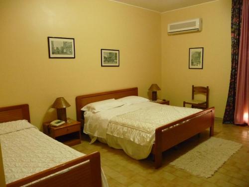 Postel nebo postele na pokoji v ubytování Agathae Hotel & Residence
