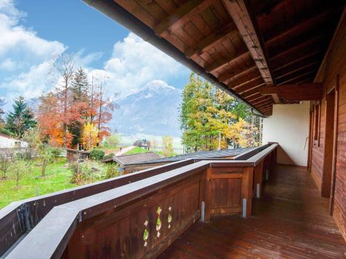 a balcony with a view of a mountain at Holiday house in Reith im Alpbachtal with garden in Reith im Alpbachtal