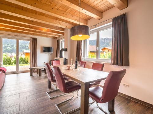 a dining room with a table and chairs at Chalet in Koetschach-Mauthen in Carinthia in Kötschach