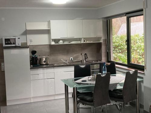 Kuchyň nebo kuchyňský kout v ubytování Ferienwohnung Haus Ilse