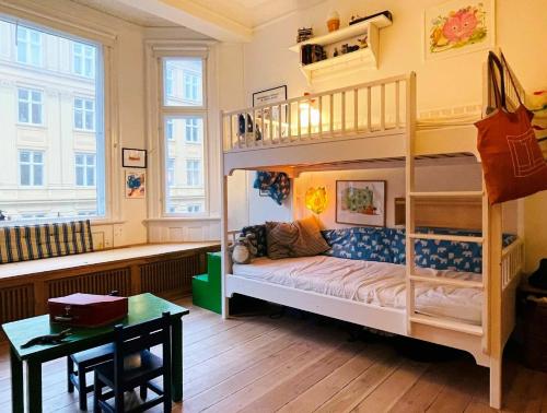 En eller flere senge i et værelse på ApartmentInCopenhagen Apartment 1282