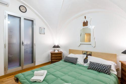 Posteľ alebo postele v izbe v ubytovaní Cattedrale di Firenze Apartment
