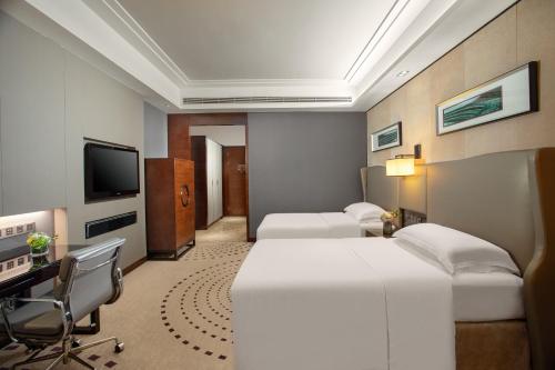 Μια τηλεόραση ή/και κέντρο ψυχαγωγίας στο Crowne Plaza Huizhou by IHG