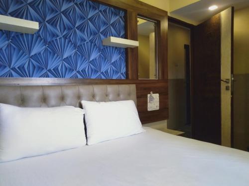 Ένα ή περισσότερα κρεβάτια σε δωμάτιο στο Soni Punjab Guest House