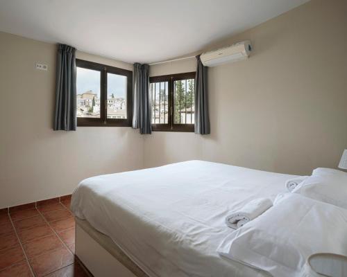 Apartamentos Óptima Palacete de la Alhambra junto a la ...