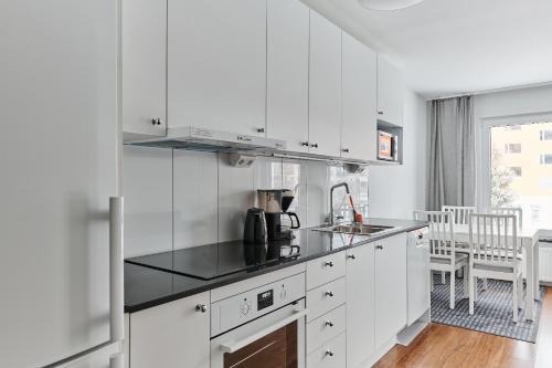 Kuchyň nebo kuchyňský kout v ubytování Continental Apartment Hotel Knivsta