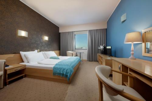 Hotel Zovko Zagrebにあるベッド