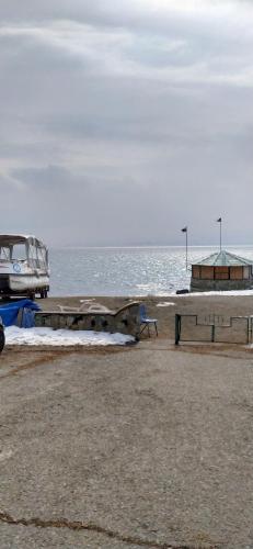 a bus parked on a beach next to the ocean at HOTEL N1 in Yerevan