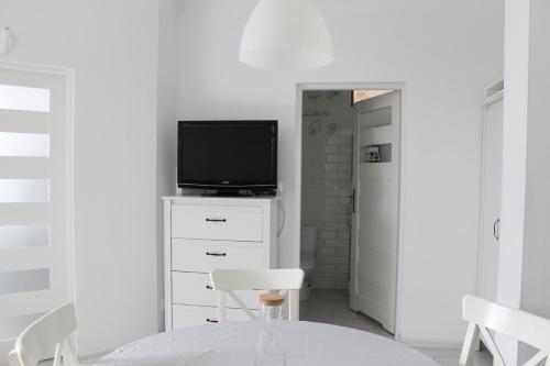 Μια τηλεόραση ή/και κέντρο ψυχαγωγίας στο Apartament w porcie