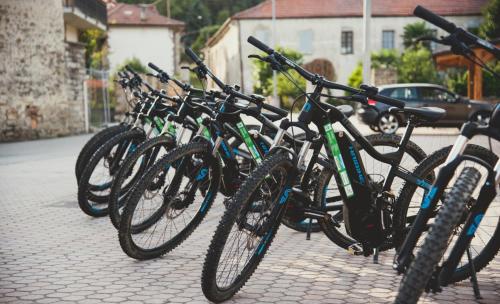 a row of bikes parked on a street at Agri BERTORELLA in Cuneo