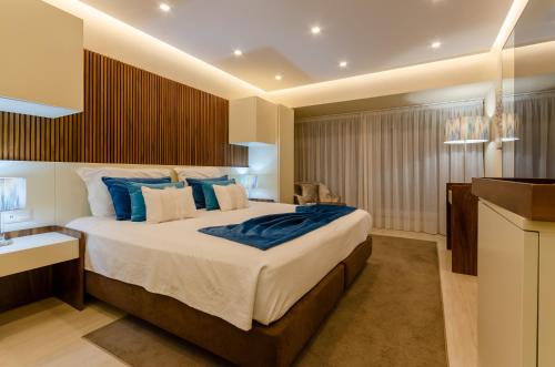 Una cama o camas en una habitación de Hotel Lido