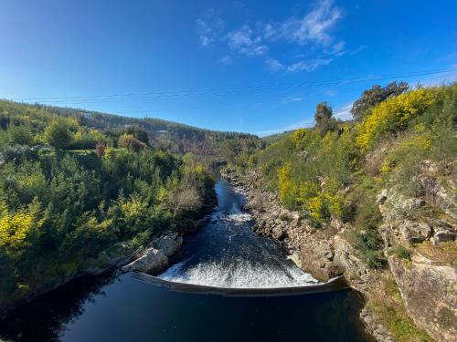an aerial view of a river in a valley at Encosta do Sol in Canas de Senhorim