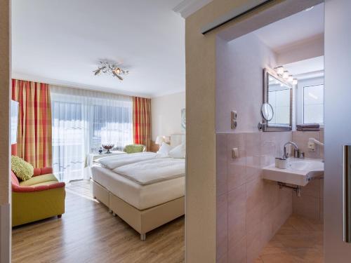 Una cama o camas en una habitación de Bergheim
