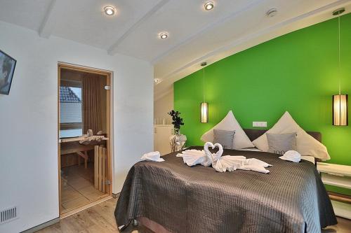 Postel nebo postele na pokoji v ubytování Residenz Herrenbruchstr Residenz Herrenbruchstraße 5 Appartement 8