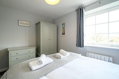 Voodi või voodid majutusasutuse The Loft - Aldeburgh Coastal Cottages toas